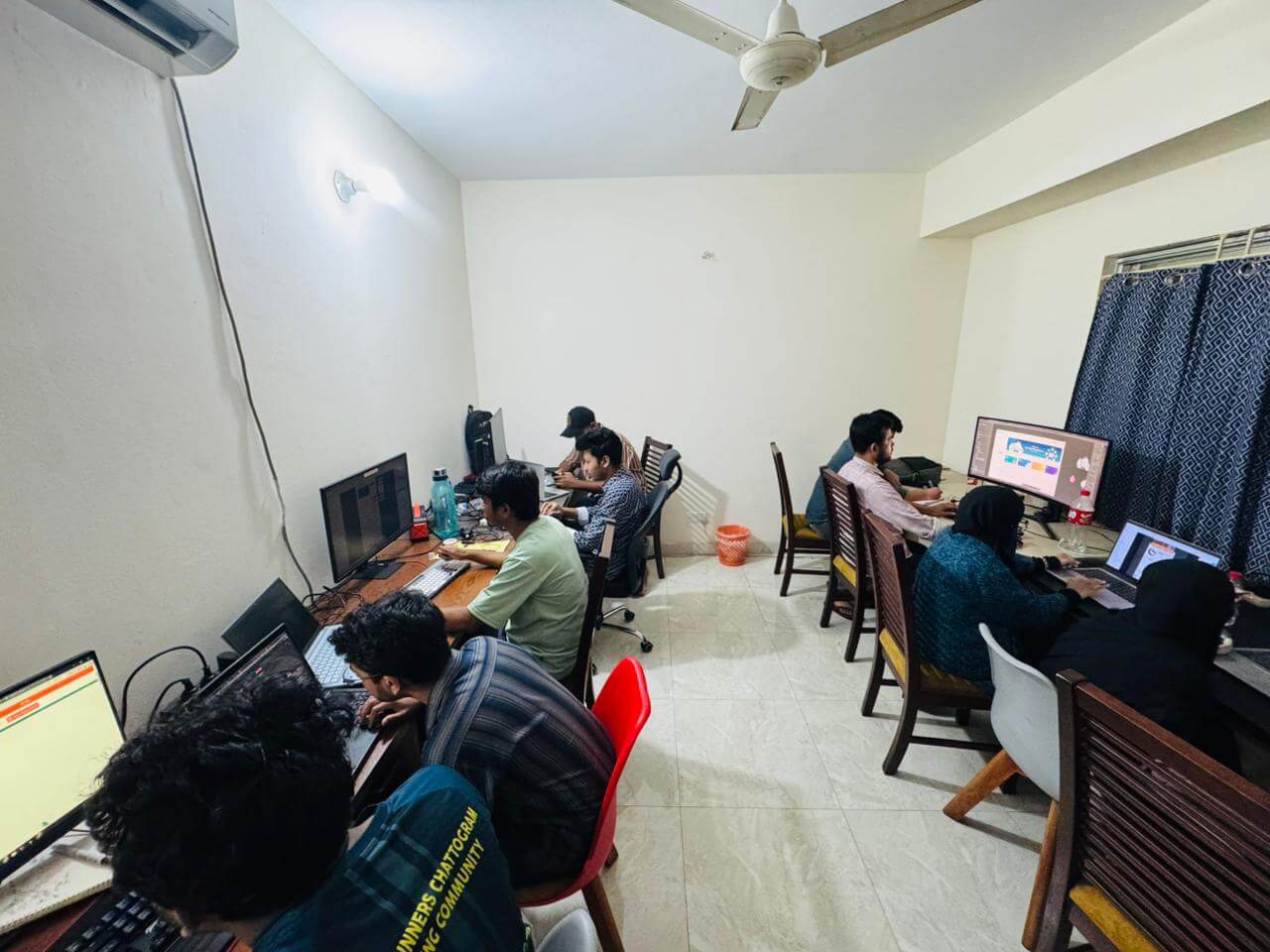 LozicLabs teammates working in the office